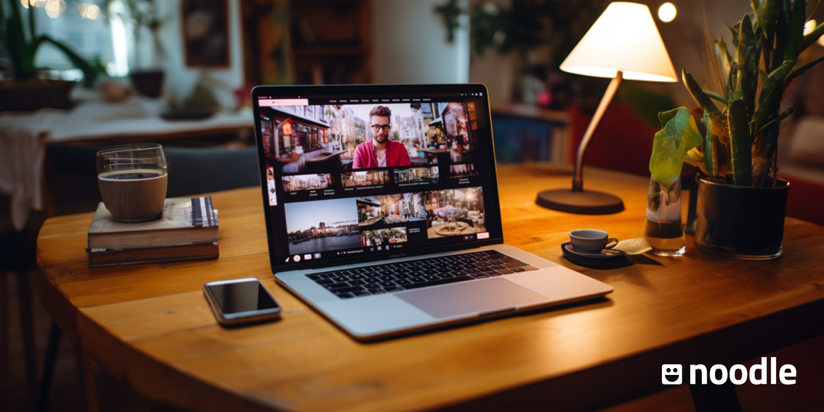 A laptop on a desk displaying a virtual class, one example of a course you can sell online. 